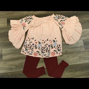 Flowy floral tunic with leggings.